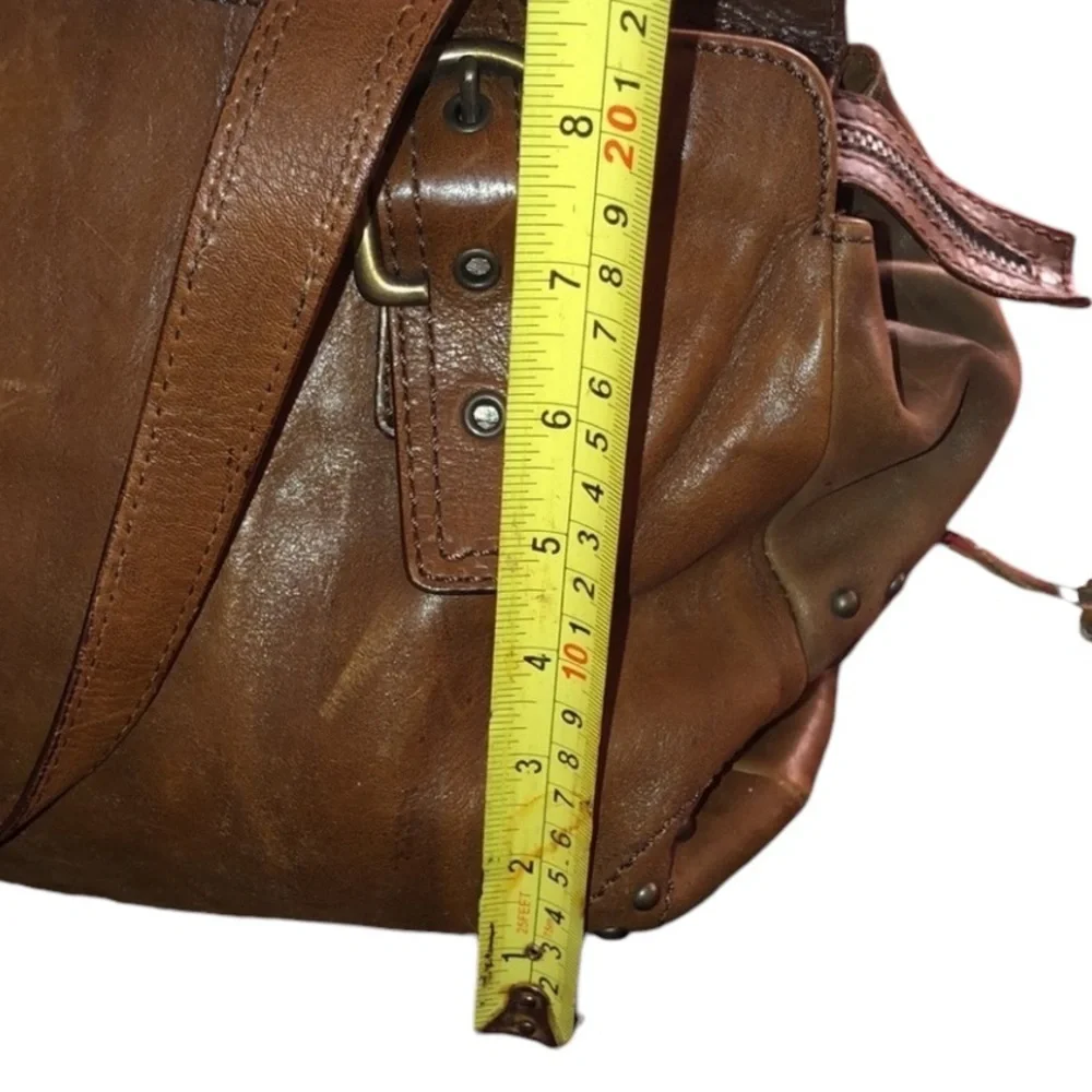 Capacciou large brown Leather bag  side zip pockets 2  long leather tassels